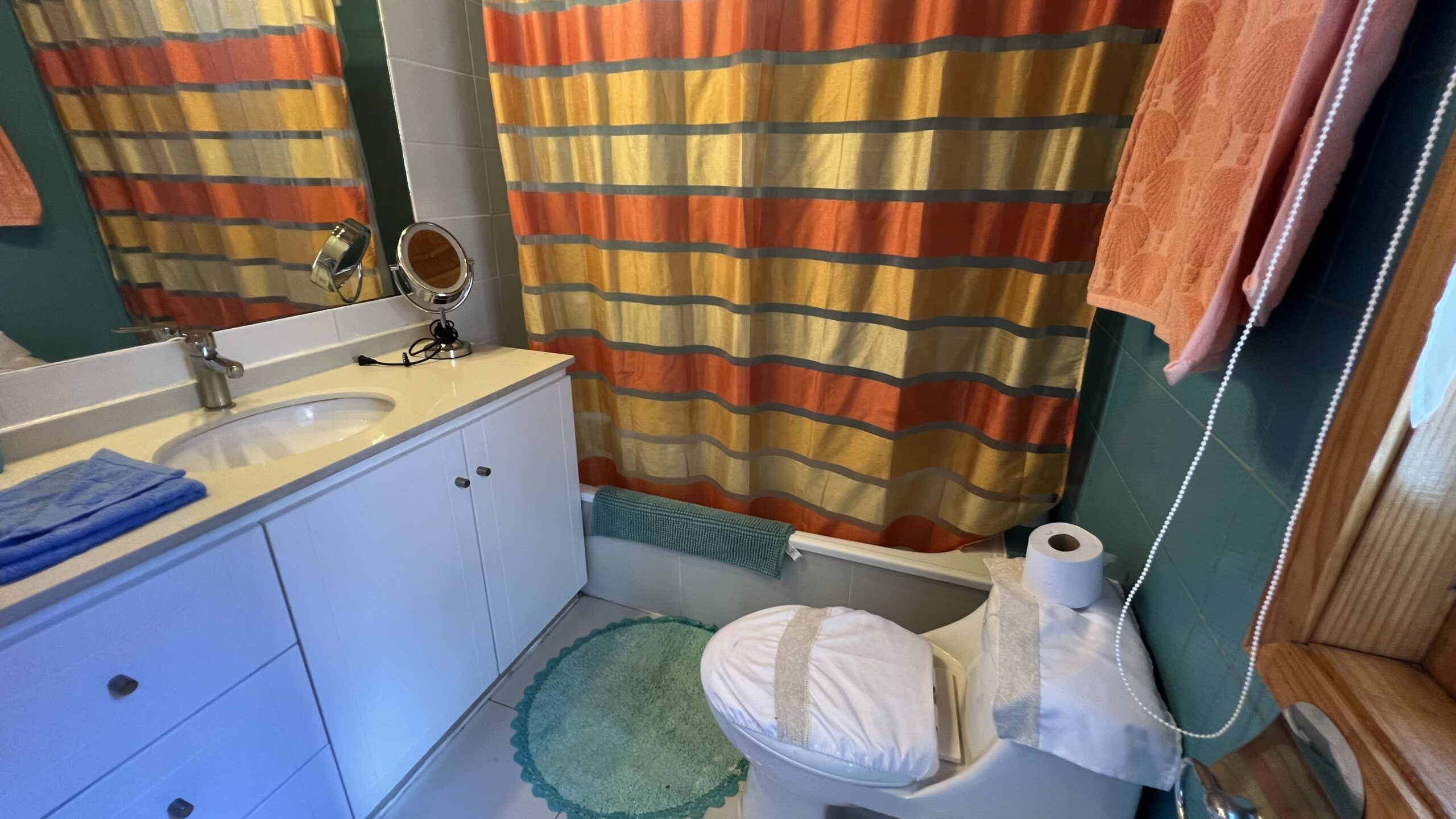 H baño arriba